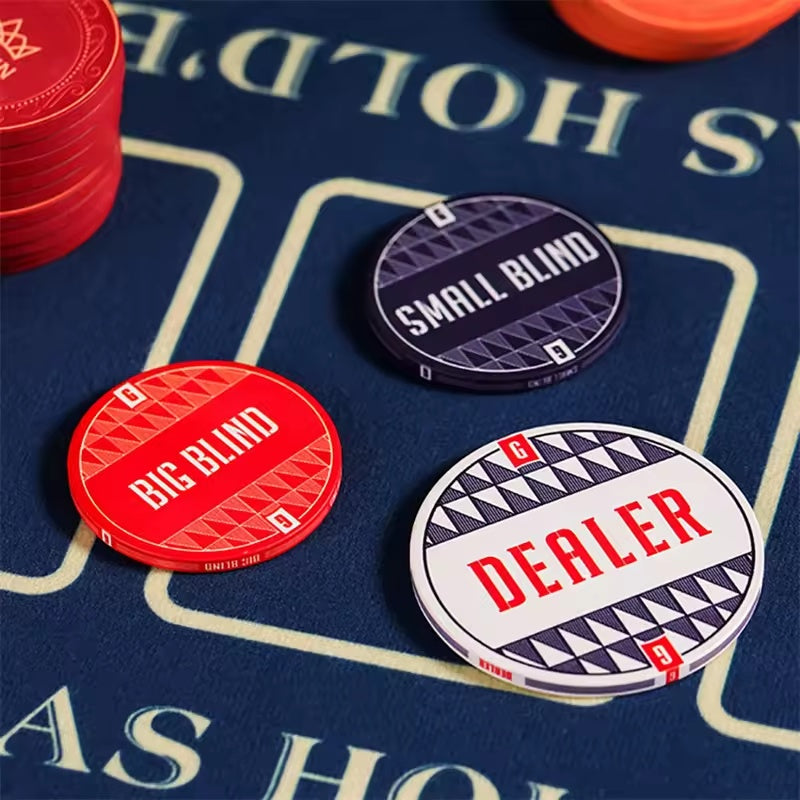 Poker blinds and dealer button on poker table